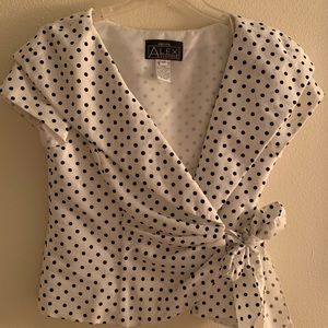 Polka dot cocktail top with white background.